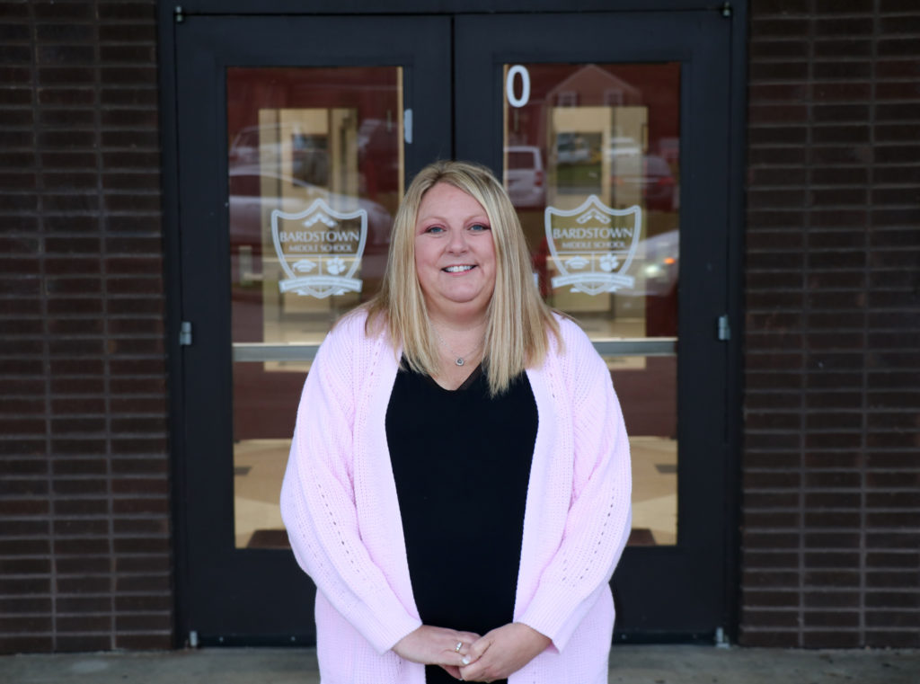 Melissa Taylor standing in front of Bardstown Middle School