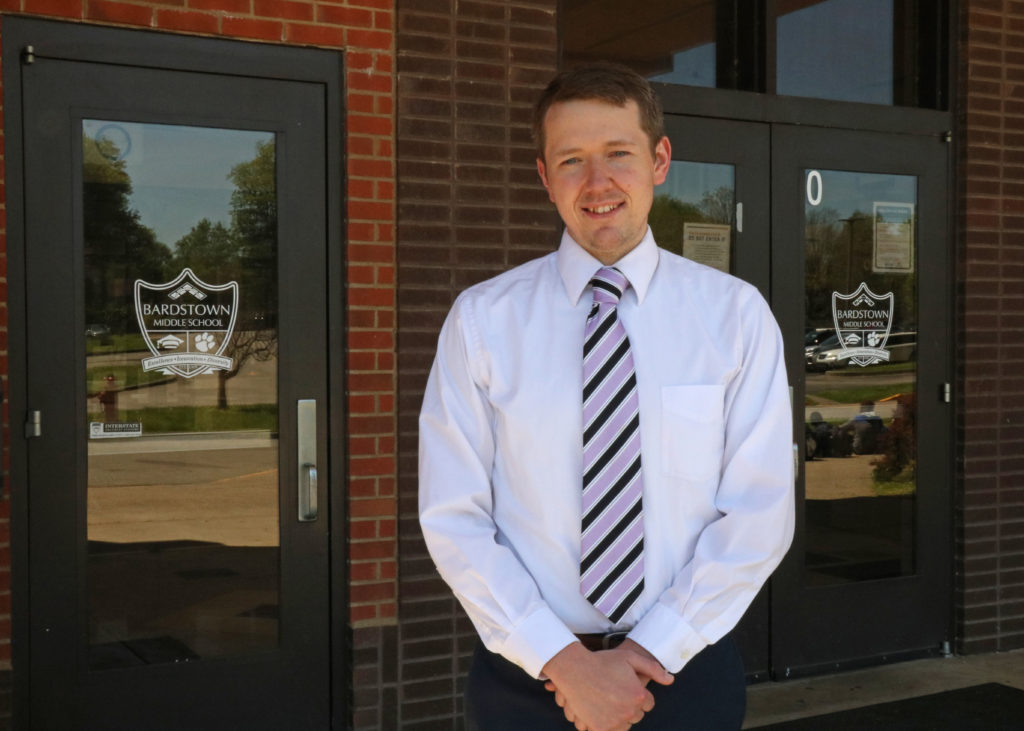 Matthew Bartley stands in front of Bardstown Middle School