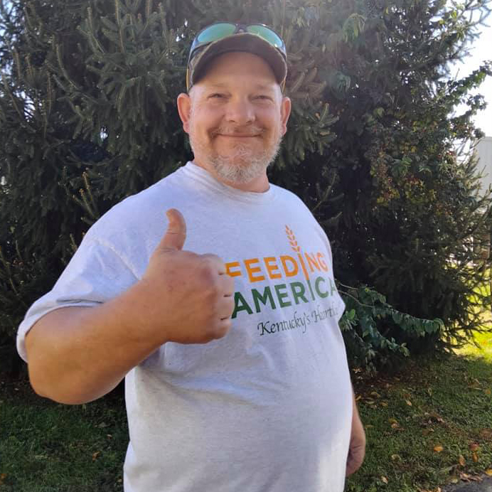 Feeding America helper thumbs up