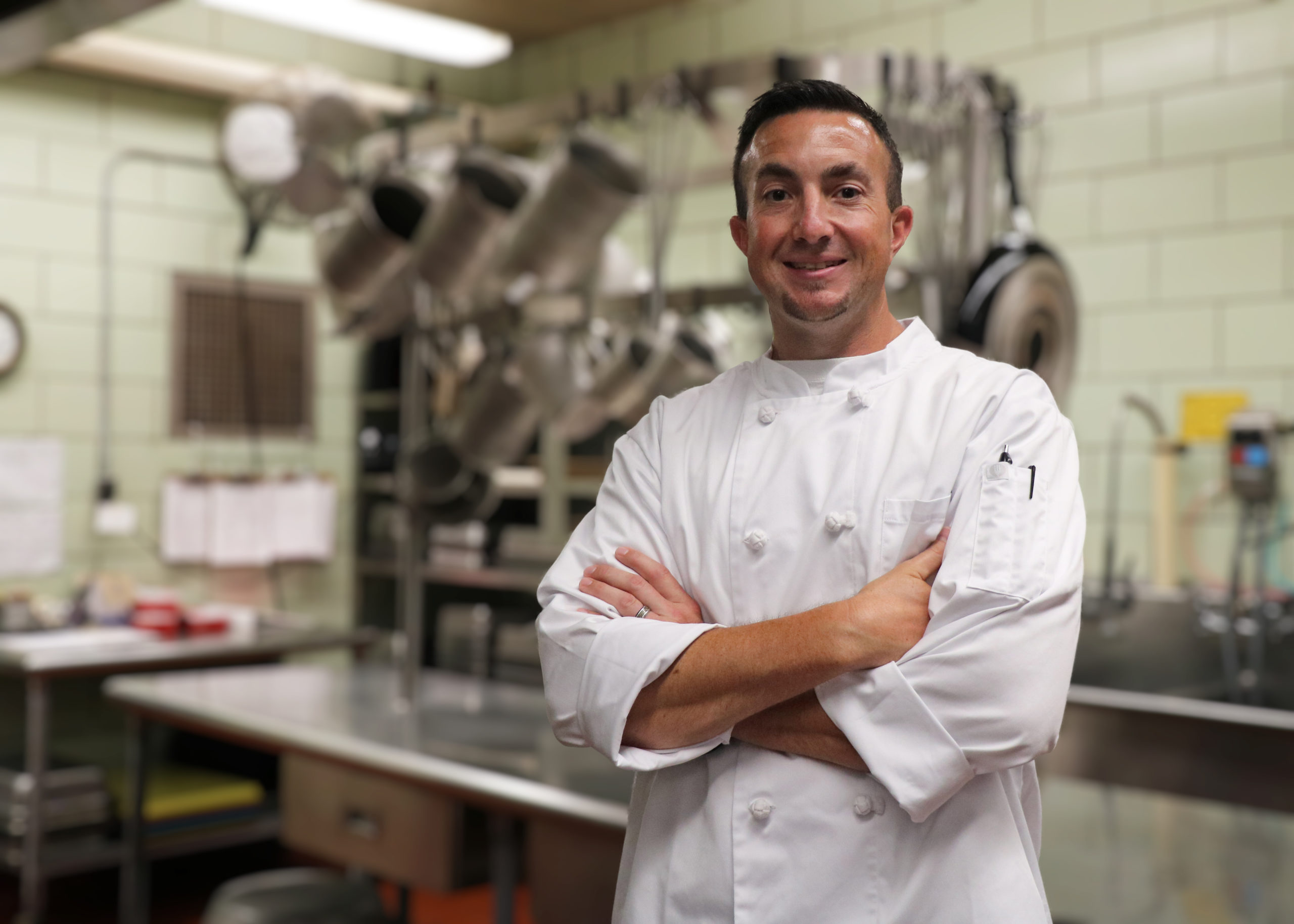 Chef Justin Whitsell stands in the kitchen at Bardstown High.