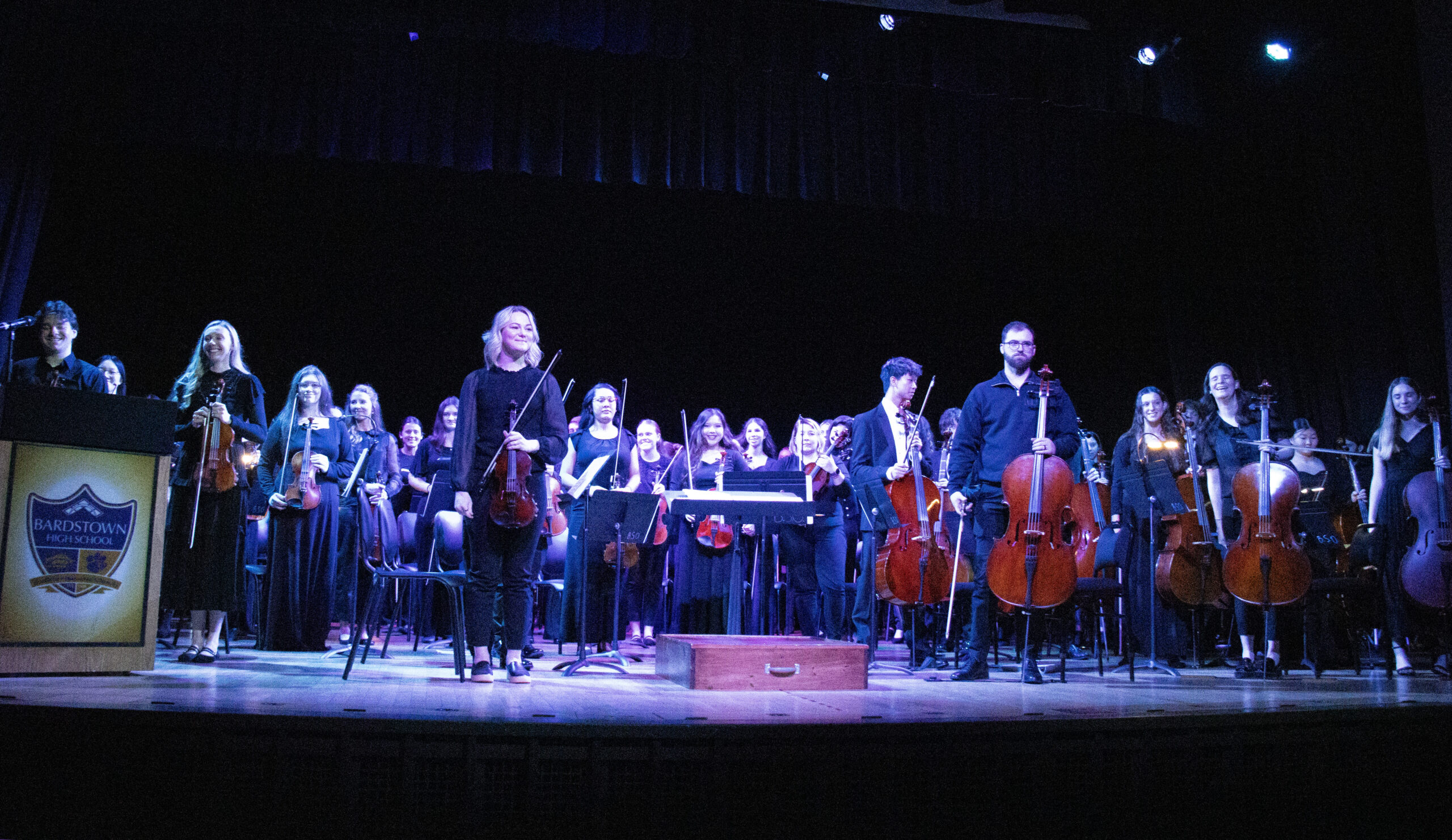 The alumni and high school joint orchestra takes a bow.